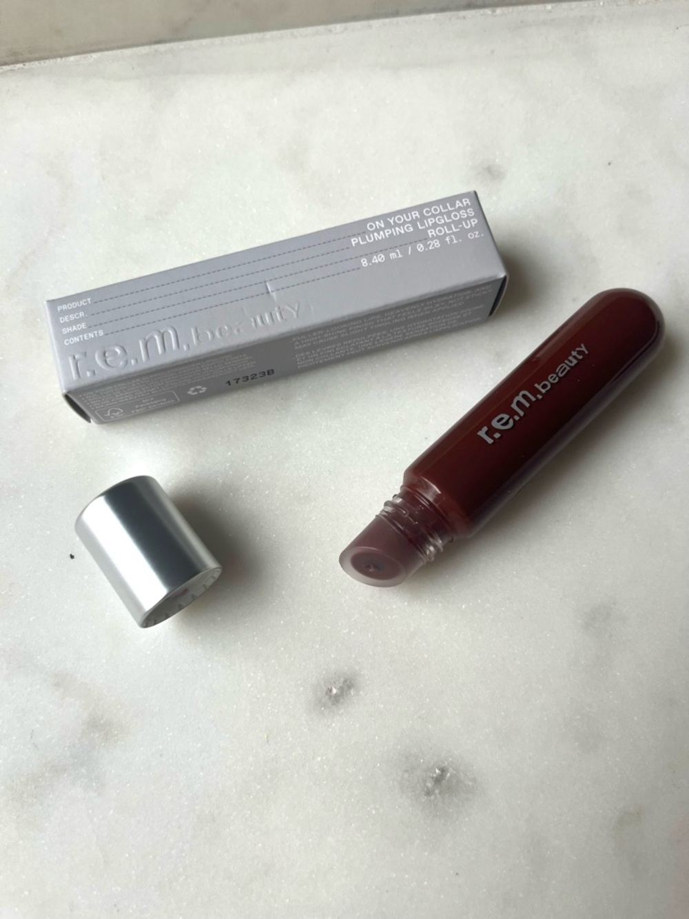 r.e.m. beauty by Ariana Grande, On Your Collar Plumping Lip Gloss “Rollup” Shade